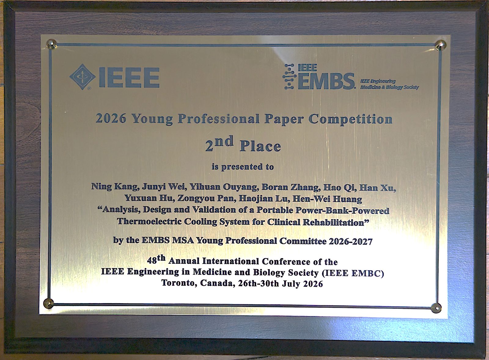 IEEE EMBS 2026 Young Professional Paper Competition 2nd Place plaque awarded to Ning Kang and co-authors